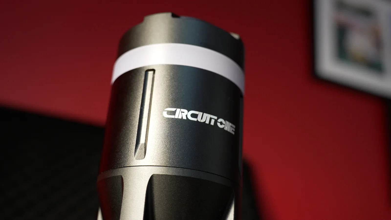 Close-up of the Circuit One logo and the white light ring on a D Force 1 actuator