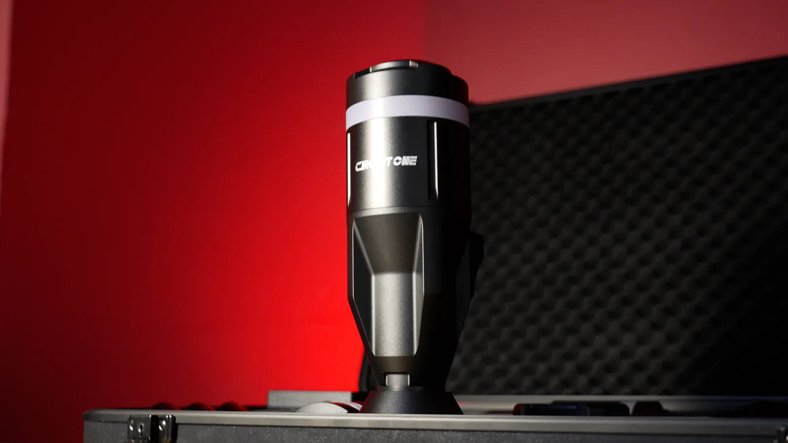 A single Circuit One D Force 1 actuator standing upright against a red backdrop