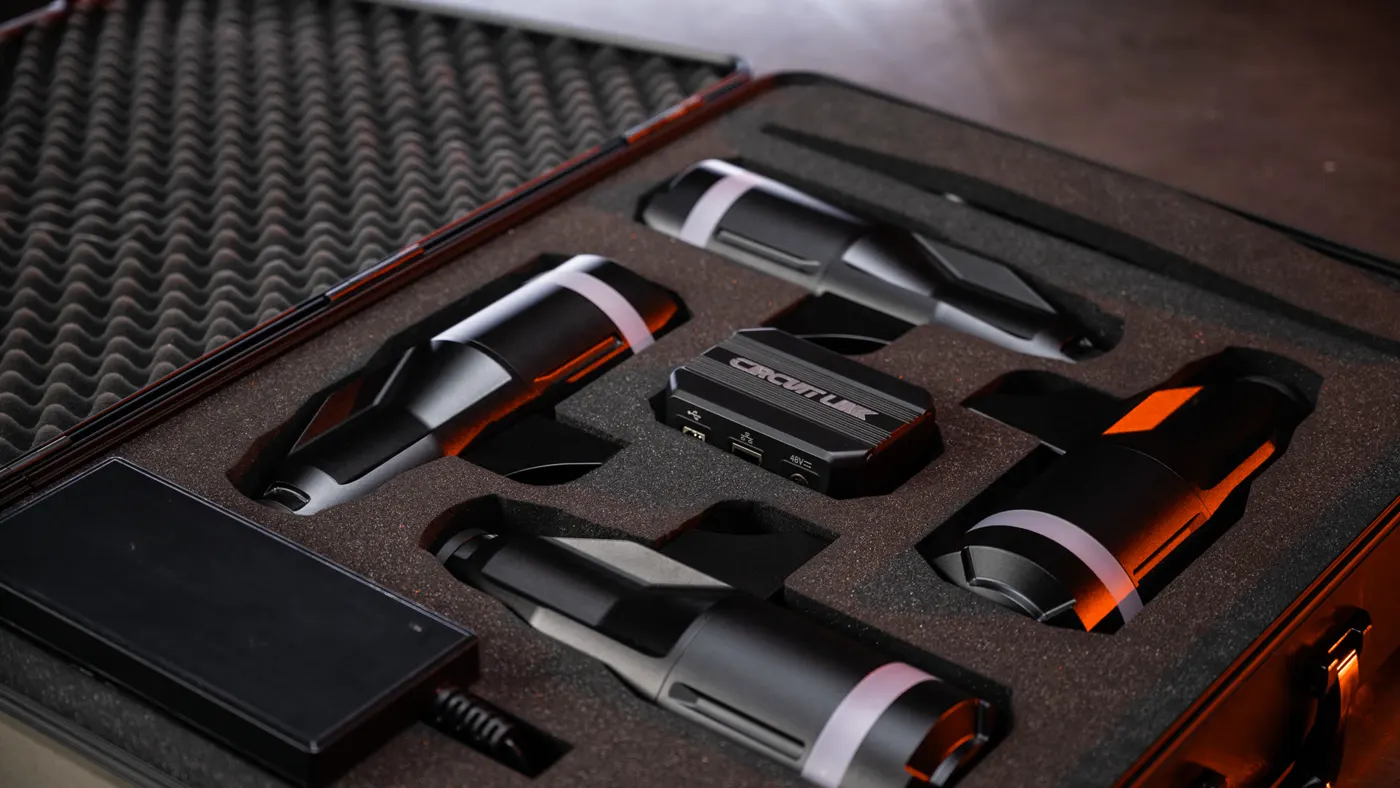 The D Force 1 packed in its foam-lined case, four actuators around the LINK box